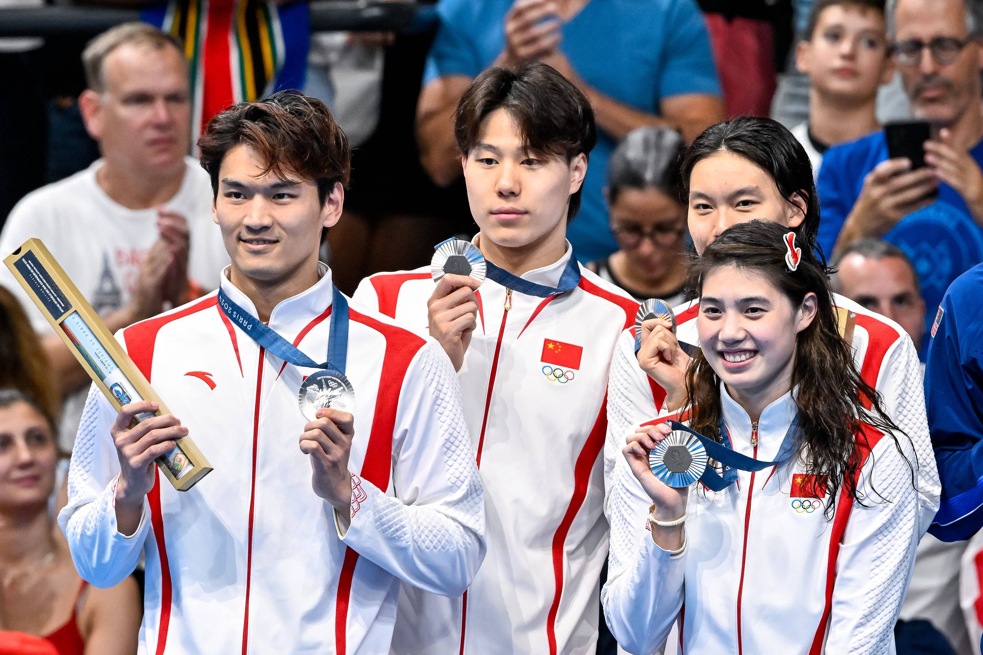 游泳混合接力再获金牌,实力强悍 游泳混合接力再获金牌,实力强悍